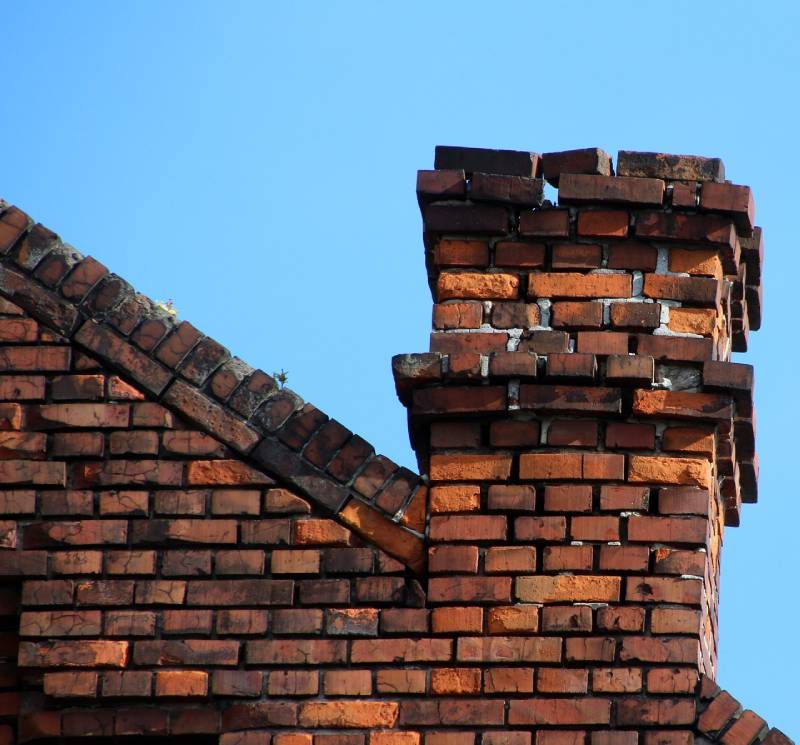 Damaged chimney on an Sparks Glencoe home showing cracks and missing mortar